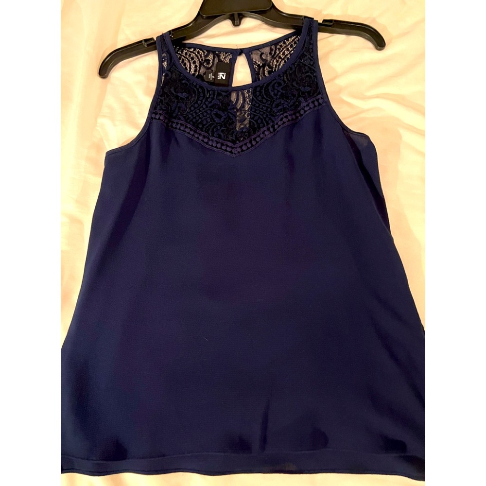 Tank top perfect for the office with lace detail on top.  Size small.